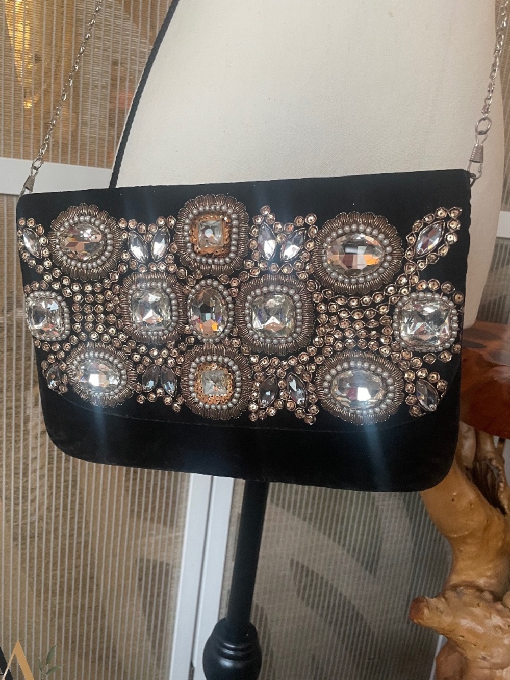 Elegant black velvet evening clutch with intricate embellishments